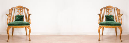 two golden thrones in an indoor panoramaの写真素材