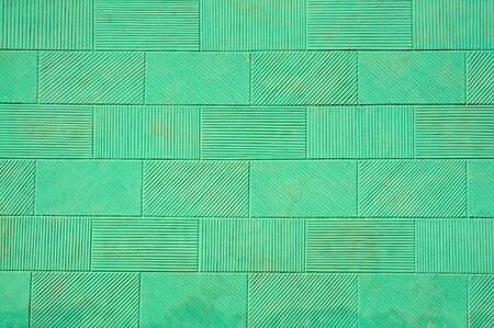 The texture of the old stucco wall.