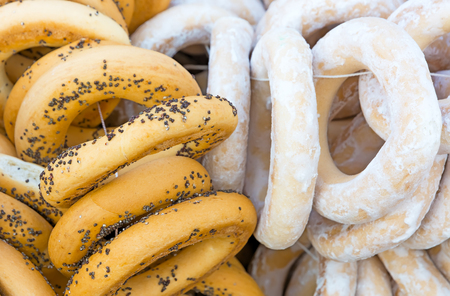 Bundles bagels with poppy seeds and sugar. Picture taken at the spring fair under the open sky....