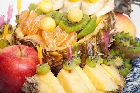 plate of different fruits isolated on a white background. Shallow depth of fieldの写真素材