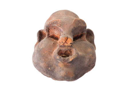 old dusty clay toy head isolated on white backgroundの写真素材