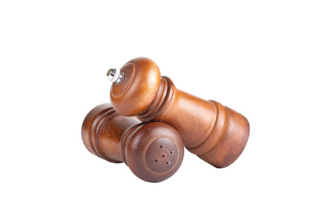pepper and salt shaker made ââof wood isolated on white backgroundの写真素材