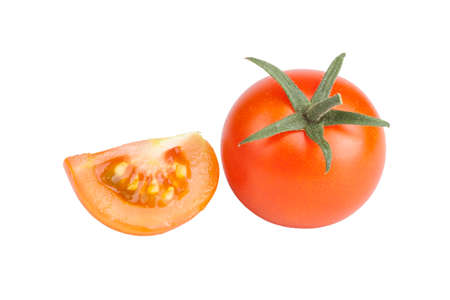 A red and yellow tomato sliced ââisolated on white backgroundの写真素材