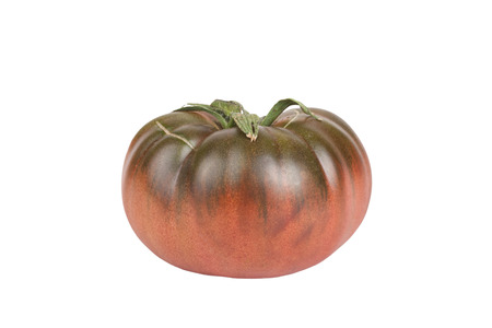tomato green and red with a crack isolated on white backgroundの写真素材