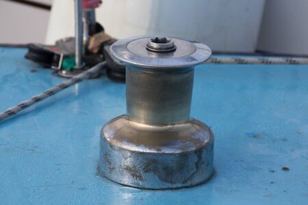 Sailboat detailed parts, close up on winch and rope of yacht , shallow depth of fieldの写真素材