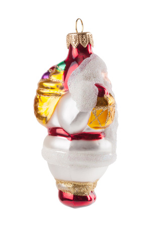 old Santa Claus christmas decoration ball isolated on whiteの写真素材