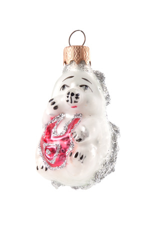 old hedgehog christmas decoration ball isolated on whiteの写真素材