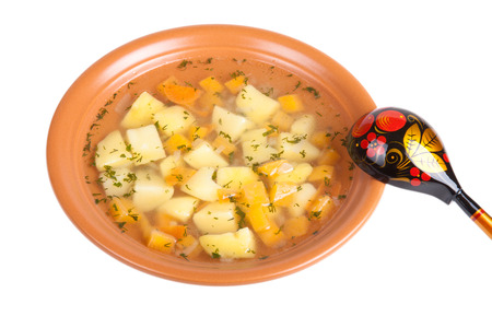 vegetable soup with potatoes isolated on white background.の写真素材