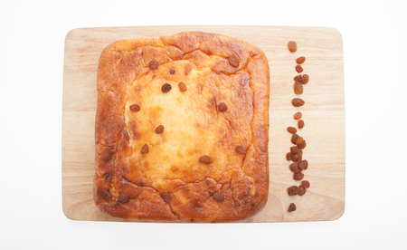 Cottage cheese casserole  with  raisins on a white backgroundの写真素材
