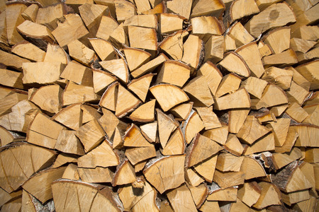 chopped firewood stackedの写真素材