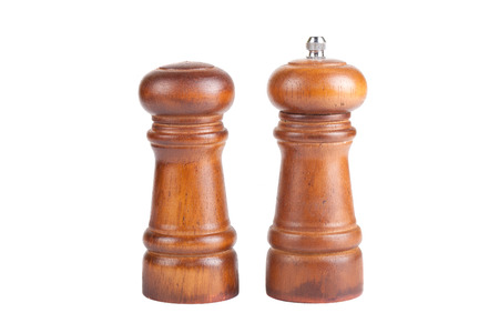 pepper and salt shaker made ââof wood isolated on white backgroundの写真素材