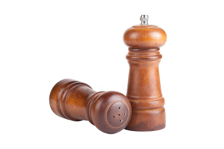 pepper and salt shaker made ââof wood isolated on white backgroundの写真素材