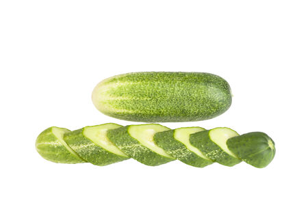 chopped ââcucumber isolated on white backgroundの写真素材