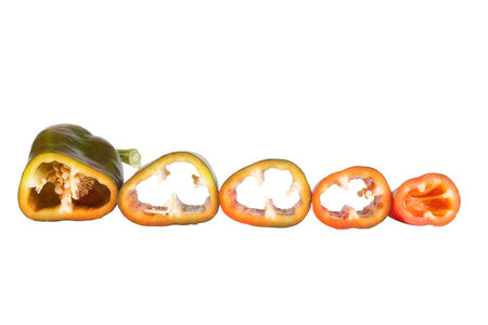 cut into slices of pepper isolated on a white backgroundの写真素材