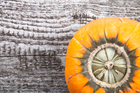 autumn background with pumpkin on wooden boardの写真素材
