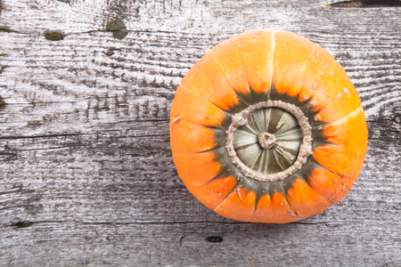 autumn background with pumpkin on wooden boardの写真素材