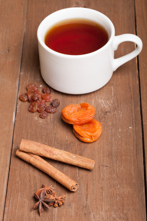 cup of tea on an old wooden table. small depth of fieldの写真素材