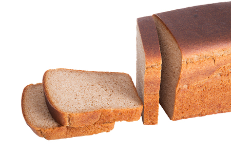 sliced ââloaf of black rye bread isolated on white backgroundの写真素材