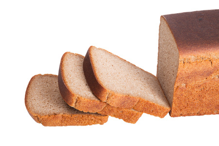 sliced ââloaf of black rye bread isolated on white backgroundの写真素材