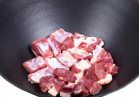 prepared meat in a cauldronの写真素材