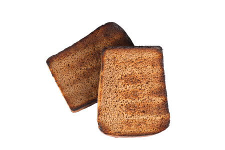 Slices of rye bread grilled isolated on white backgroundの写真素材
