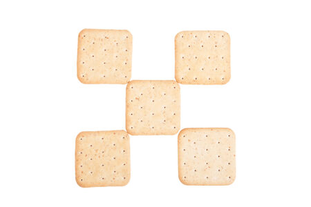 Biscuits lined checkered isolated on white backgroundの写真素材