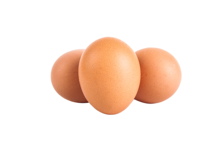 three eggs isolated on white background. Shallow depth of fieldの写真素材