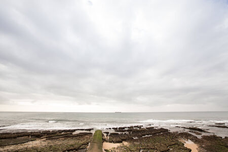dramatic Atlantic coast at low tide.の写真素材