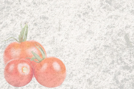 Textured old stone with three red tomatoes of different sizesの写真素材