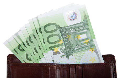 Money in your wallet. Several bills of 100 euros. Isolated on white backgroundの写真素材