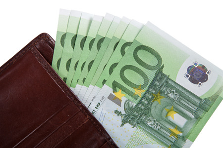 Money in your wallet. Several bills of 100 euros. Isolated on white backgroundの写真素材