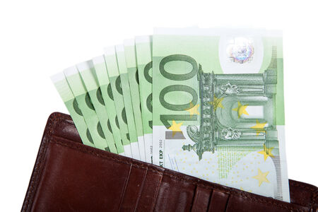Money in your wallet. Several bills of 100 euros. Isolated on white backgroundの写真素材