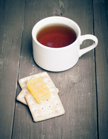 cup of tea on an old wooden table. small depth of fieldの写真素材