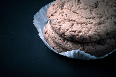 Oat cookies on the old shabby background. tintedの写真素材