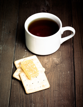 cup of tea on an old wooden table. small depth of fieldの写真素材