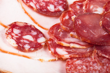 The background - detail of sliced salamiの写真素材