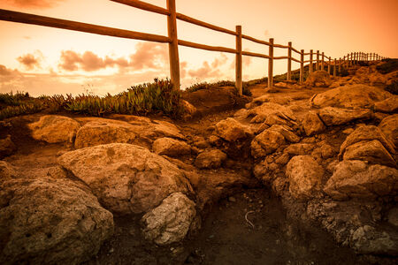 Wooden fence on the edge of Europe. Sunset. tintedの写真素材