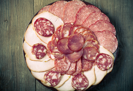 plate with different kinds of sausagesの写真素材