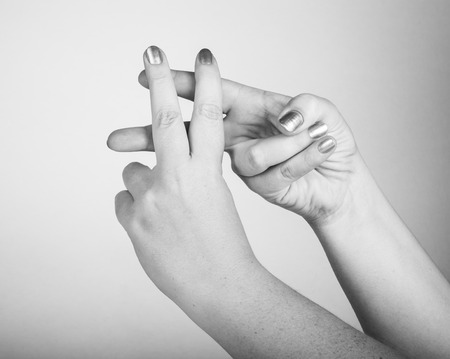 gestures with both hands, meaning "imprisoned"の写真素材