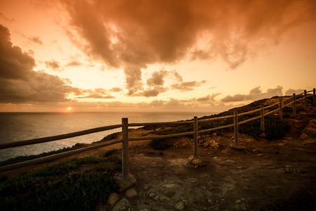Wooden fence on the edge of Europe. Sunset. tintedの写真素材