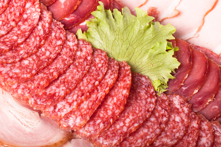 The background - detail of sliced salamiの写真素材