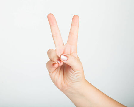 hand gesture, meaning "victory"の写真素材