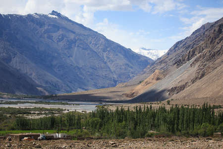The valley at the foot of the mountains on Pamir. Spring. Tajikistan.の写真素材