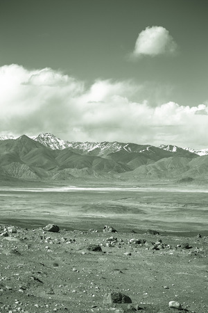 The valley at the foot of the mountains on Pamir. Spring. Tajikistan. Toned.の写真素材