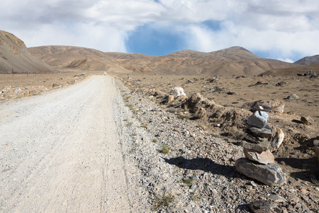 Tajikistan. Pamir highway. Road to the clouds.の写真素材