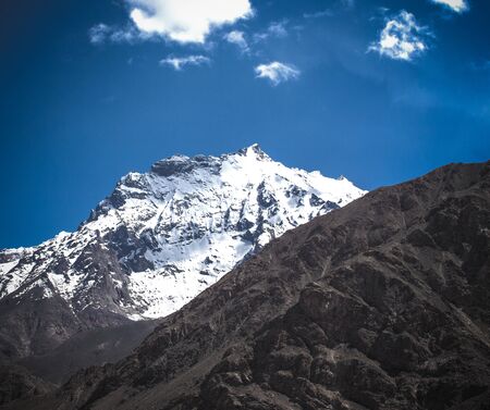 Mountains and clouds on Pamir. Spring. Tajikistan. Toned.の写真素材