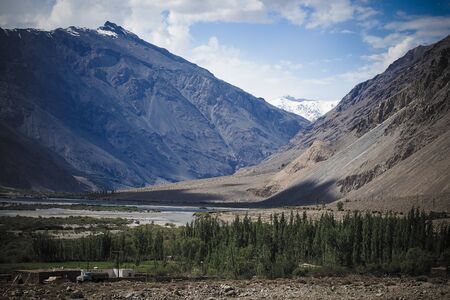 The valley at the foot of the mountains on Pamir. Spring. Tajikistan. Toned.の写真素材