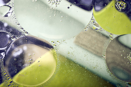 beautiful abstract colorful background, oil on water surfaceの写真素材