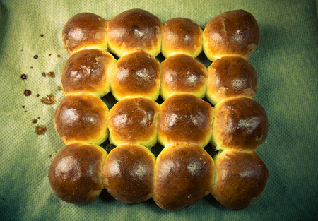 Freshly baked rolls only taken out of the oven. Toned.の写真素材