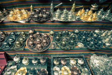 Metal tea and coffee sets on the shelf in the store. Turkey. Toned.の写真素材